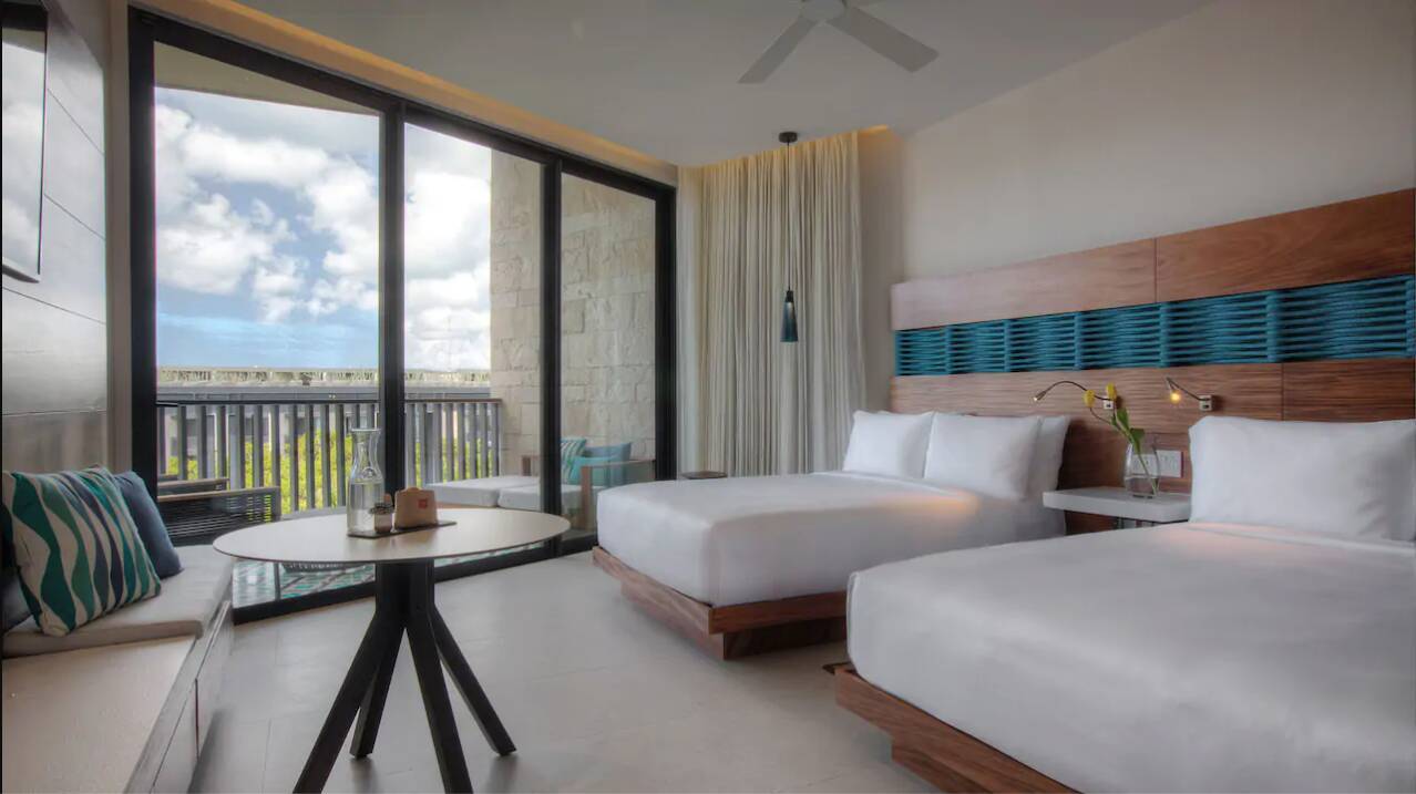 Two Queen Beds with Partial Ocean View