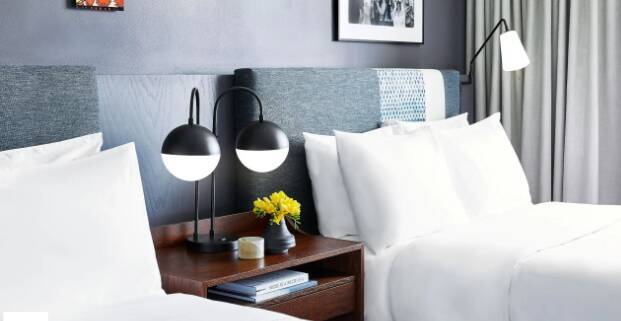 TWO DOUBLE BEDS WITH ACCESSIBLE TUB