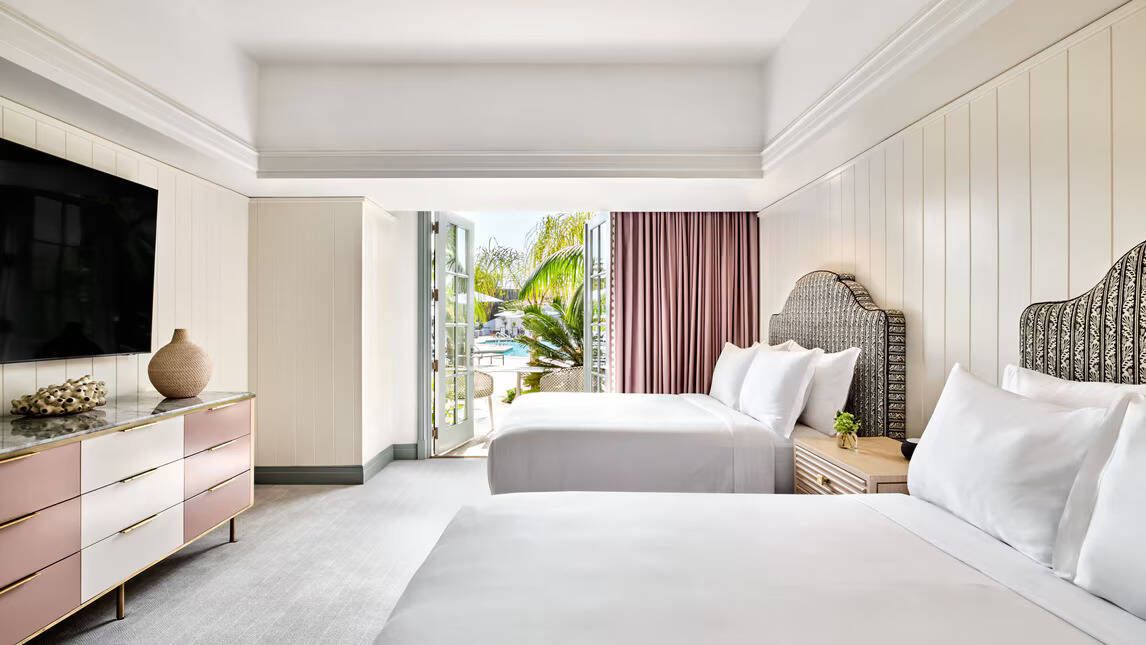 RESORT VIEW SUITE ONE BEDROOM EXECUTIVE SUITE TWO QUEEN POOLSIDE