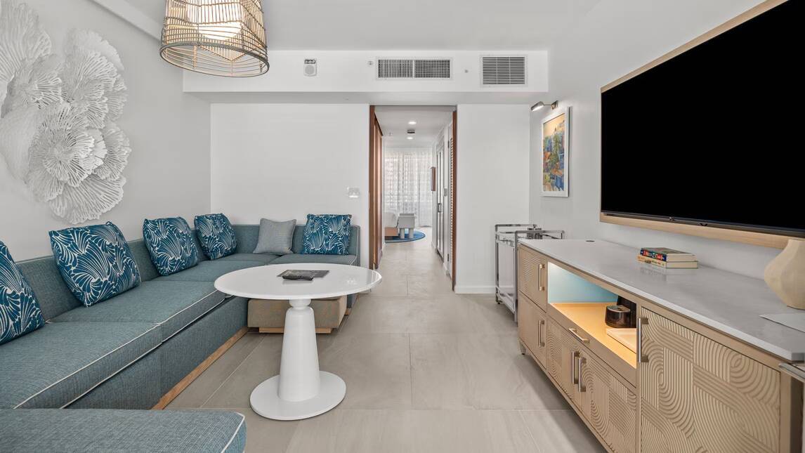 One Bedroom Deluxe Suite King Sofa bed Partial ocean view Balcony